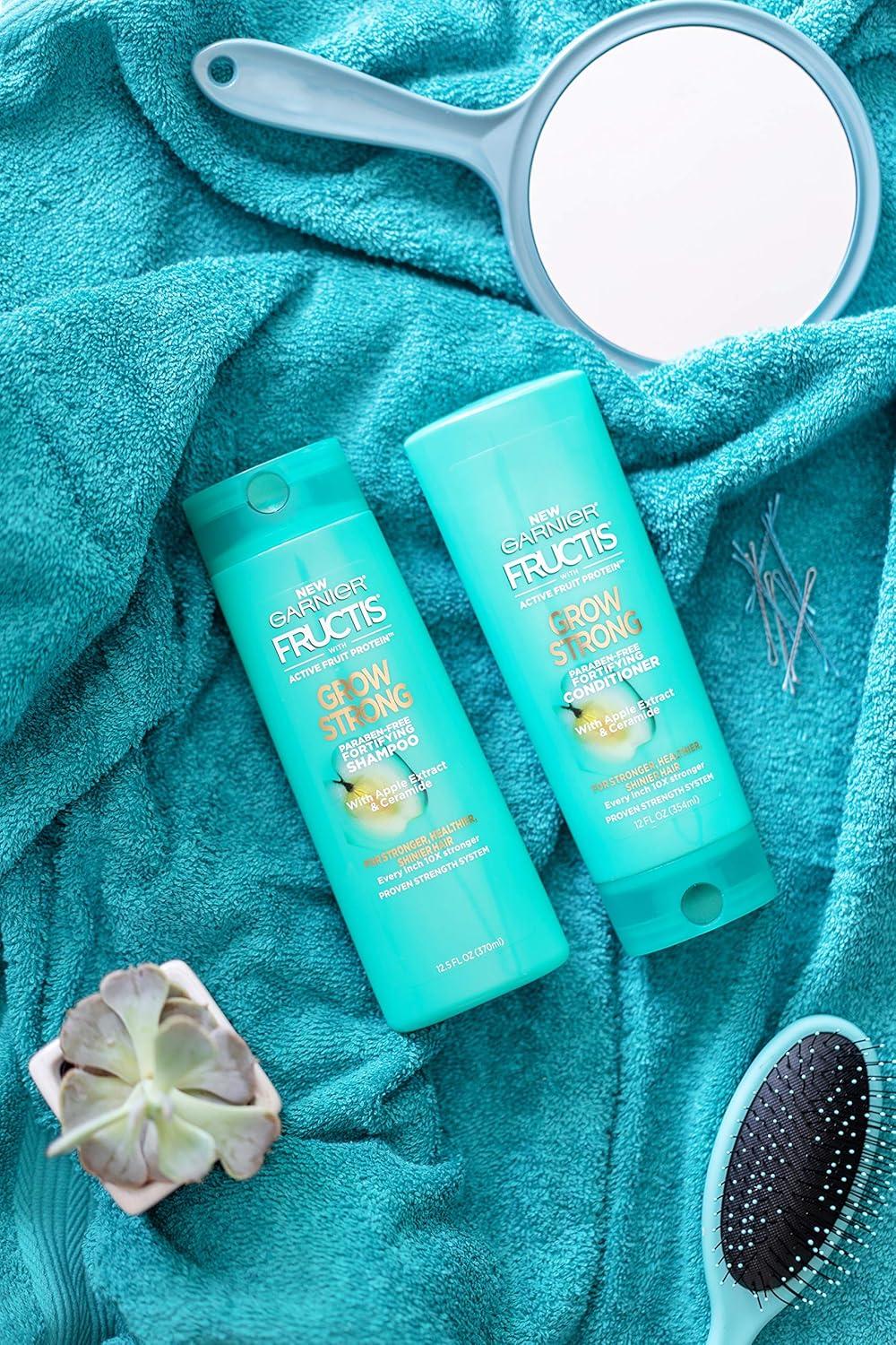 imageGarnier Fructis Grow Strong Conditioner 338 Fl Oz 1 Count Packaging May VaryCitrus