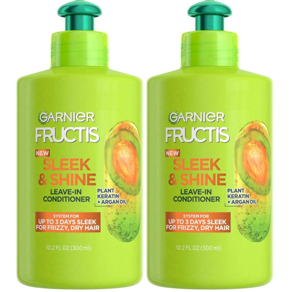 imageGarnier Fructis Sleek ampamp Shine LeaveIn Conditioning Cream for Frizzy Dry Hair Plant Keratin  Argan Oil 102 Fl Oz 1 Count Packaging May Vary102 Fl Oz Pack of 2