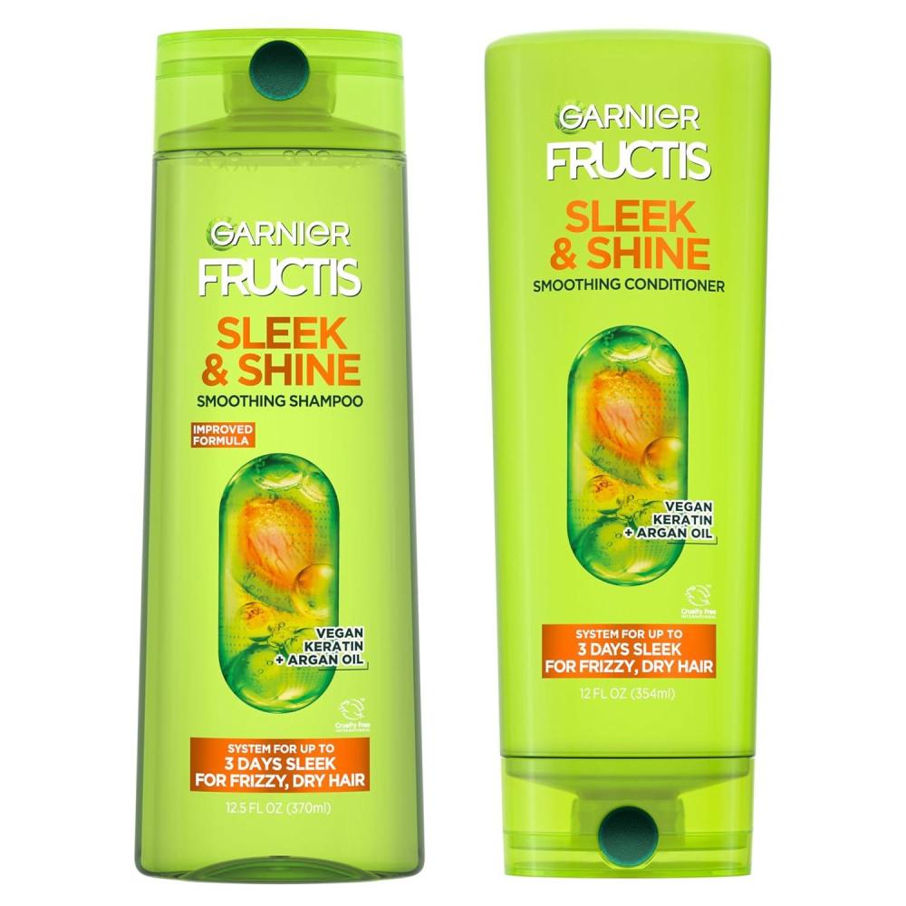 imageGarnier Fructis Sleek ampamp Shine Shampoo 22 Fl Oz  Conditioner 21 Fl Oz Set for Frizzy Dry Hair Plant Keratin  Argan Oil 2 Items 1 Kit Packaging May Vary215 Fl Oz Pack of 2