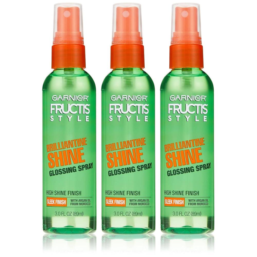 imageGarnier Fructis Style Brilliantine Shine Glossing Spray for High Shine Finish Argan Oil 3 Fl Oz 3 Count Packaging May VaryApricot
