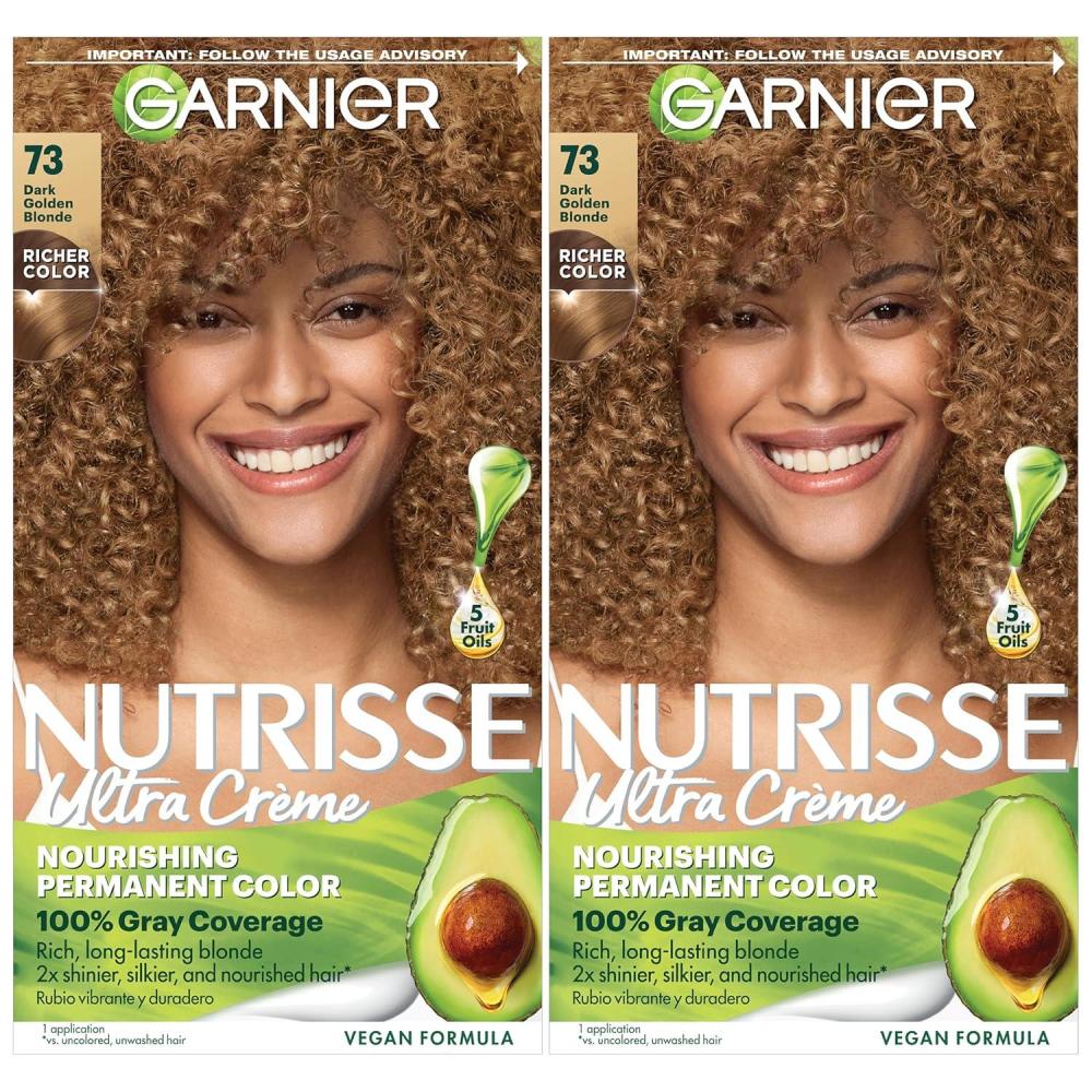 imageGarnier Hair Color Nutrisse Nourishing Creme 30 Darkest Brown Sweet Cola Permanent Hair Dye 2 Count Packaging May Vary73 Dark Golden Blonde Honey Dip