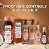 imageGarnier Whole Blends Coconut Oil ampamp Cocoa Butter Smoothing Shampoo and Conditioner Set for Frizzy Hair 22 Fl Oz 2 Items 1 Kit Packaging May Vary